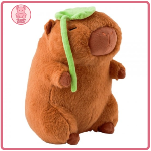 Thú bông capybara cầm lá cây ngộ nghĩnh